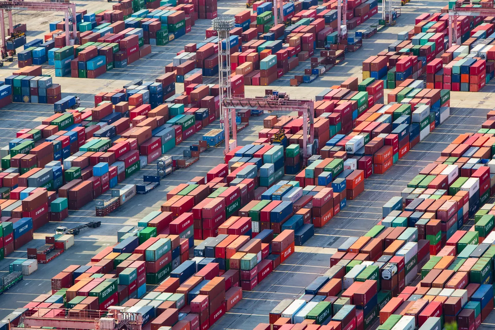 Containers and cargo handling equipment in a modern supply chain hub
