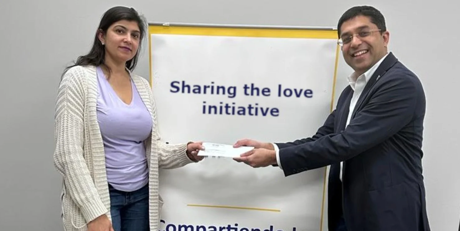 Gaddafi Ismail presenting a contribution to an Orbis representative